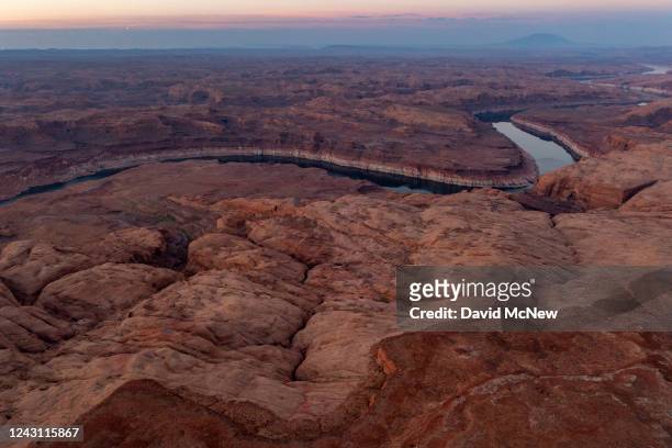 In an aerial view from just outside of Glen Canyon National Recreation Area, Lake Powell is seen on September 8, 2022 near Ticaboo, Utah. The light...