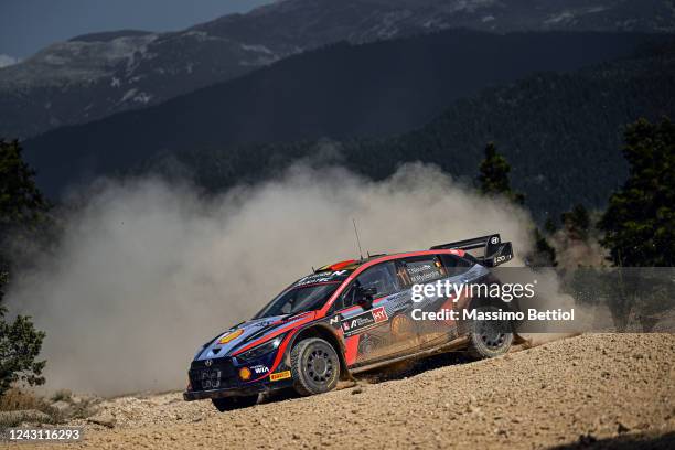 Thierry Neuville of Belgium and Martijn Wydaeghe of Belgium compete with their Hyundai Shell Mobis WRT Hyundai i20N Rally1 Hybrid during Day Three of...