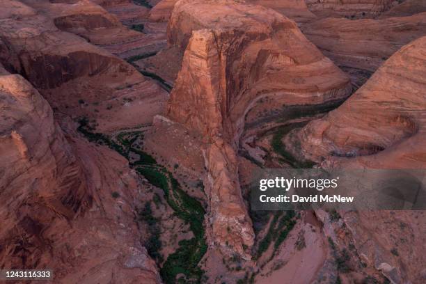 In an aerial view, a canyon south of Glen Canyon National Recreation Area flows toward Lake Powell on September 6, 2022 in Hite, Utah. The federal...