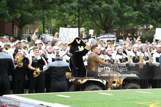 Nation host and former Vanderbilt Commodores quarterback Jordan Rodgers rides ATV with the Vanderbilt Commodores mascot during the opening of SEC...