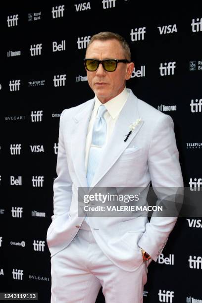 British actor Daniel Craig arrives for the premiere of "Glass Onion: A Knives Out Mystery" during the Toronto International Film Festival in Toronto,...