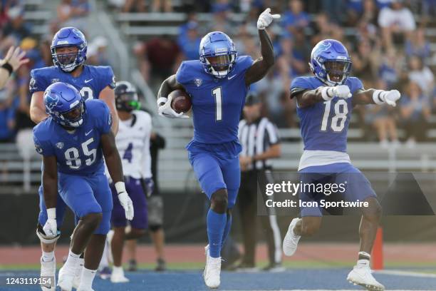 Buffalo Bulls wide receiver Justin Marshall and wide receiver Jamari Gassett celebrate a touchdown catch by Marshall during the first quarter of a...