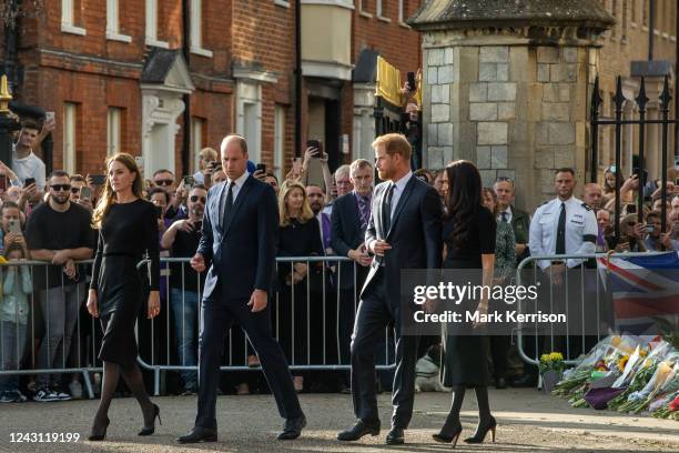 Prince William and Catherine, the new Prince and Princess of Wales, accompanied by Prince Harry and Meghan, the Duke and Duchess of Sussex, proceed...