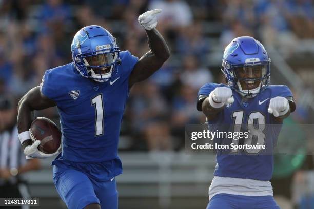 Buffalo Bulls wide receiver Justin Marshall and wide receiver Jamari Gassett celebrate a touchdown catch by Marshall during the first quarter of a...