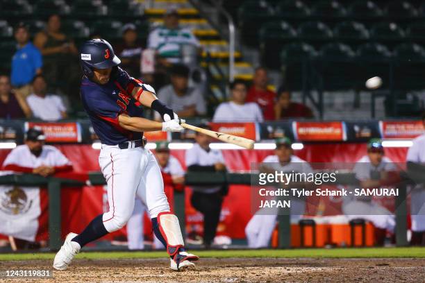 Shogo Asano of Japan hits a home run in the fifth inning during the WBSC Baseball World Cup Opening Round Group B game between Japan and Mexico at...