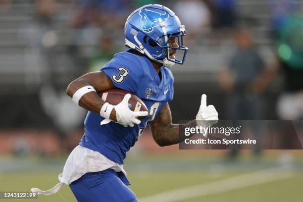 Buffalo Bulls wide receiver Quian Williams runs after a catch for a touchdown during the second quarter a college football game between the Holy...