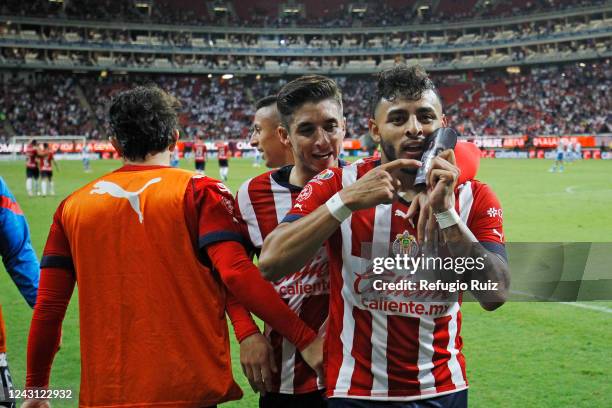 Alexis Vega of Chivas celebrates with teammates after scoring his team's first goal during the 14th round match between Chivas and Puebla as part of...