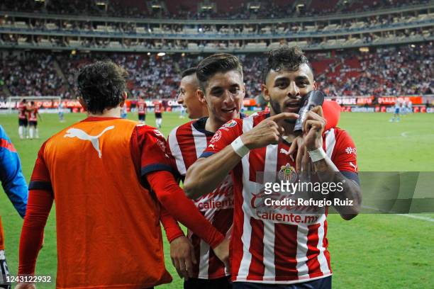 Alexis Vega of Chivas celebrates with teammates after scoring his team's first goal during the 14th round match between Chivas and Puebla as part of...