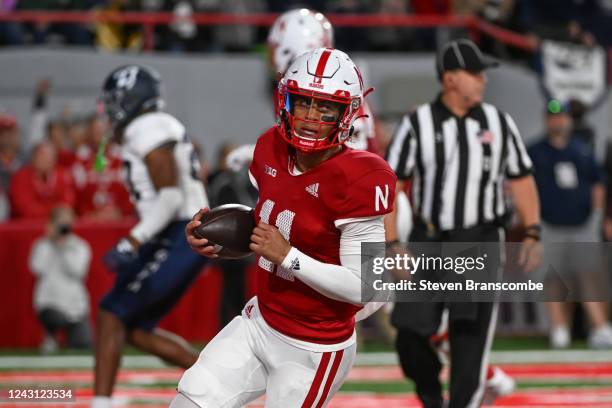 Quarterback Casey Thompson of the Nebraska Cornhuskers scores against the Georgia Southern Eagles in the first half at Memorial Stadium on September...