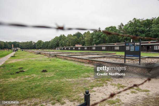 Barbed wire fence and baracks on the area of the former Nazi German concentration camp KL Stutthof is seen in Sztutowo, Poland on 10 September 2022...