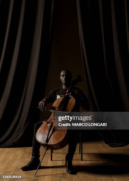 Nathi Matroos , first cellist with the Buskaid String Orchestra poses for a portrait with his instrument at the Linder Auditorium in Johannesburg, on...