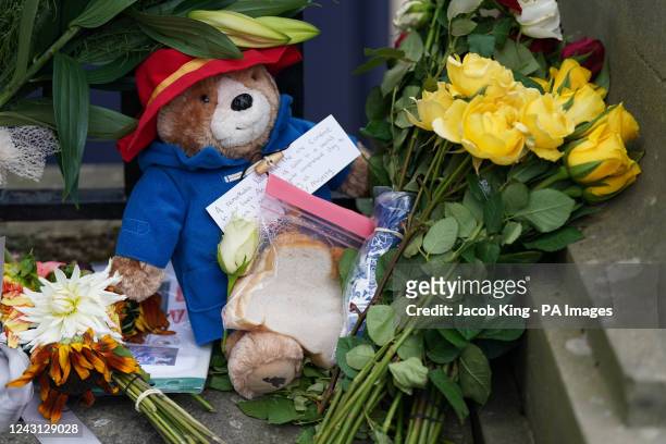 Toy Paddington Bear and a marmalade sandwich, a nod to the Queen's association with the children's book character at the Royal Jubilee, laid outside...