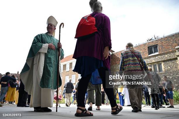 Archbishop of Canterbury, Justin Welby speaks with worshippers as they leave after the Sunday Choral Eucharist at Canterbury Cathedral, in south-east...