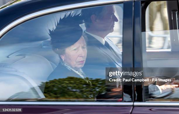The Princess Royal and her husband Admiral Sir Tim Laurence travel behind the hearse carrying the coffin of Queen Elizabeth II, draped with the Royal...
