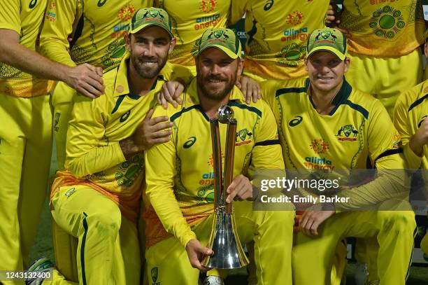 Glen Maxwell, Captain Adam Finch and Steve Smith with the Chappell-Hadlee trophy during game three of the One Day International Series between...