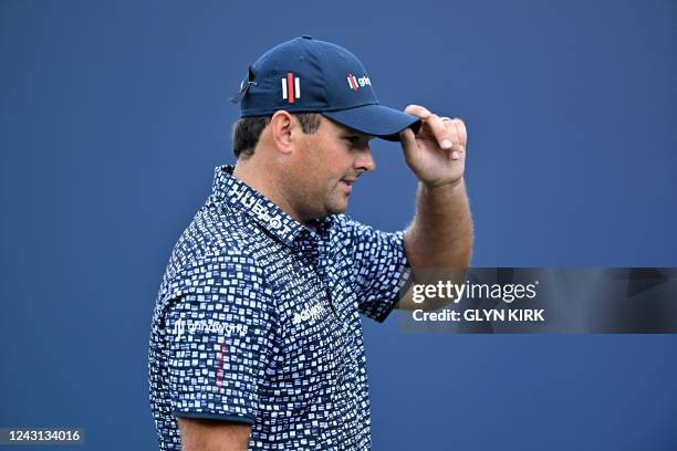 Golfer Patrick Reed reacts on the 18th green on the final day of the BMW PGA Championship at Wentworth Golf Club, south-west of London, on September...