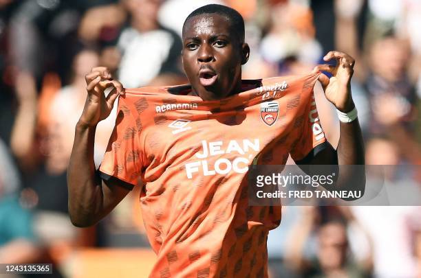 Lorient's French forward Yoann Cathline jubilates after scoring the second goal of his team during the French L1 football match between FC Lorient...