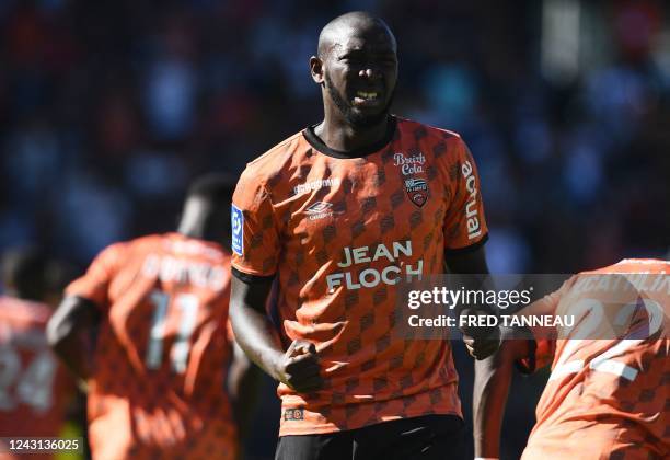 Lorient's Malian forward Ibrahima Kone celebrates after scoring the third goal of his team during the French L1 football match between FC Lorient and...