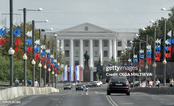 This photograph taken on August 21, 2022 shows a monument of the founder of the Soviet Union Vladimir Lenin at the central square in Pskov. Their...