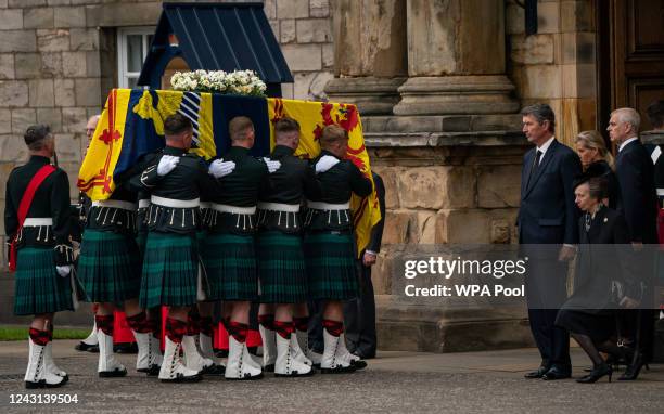 Vice Admiral Timothy Laurence, Britain's Sophie, Countess of Wessex and Britain's Prince Andrew, Duke of York look on as Britain's Princess Anne,...