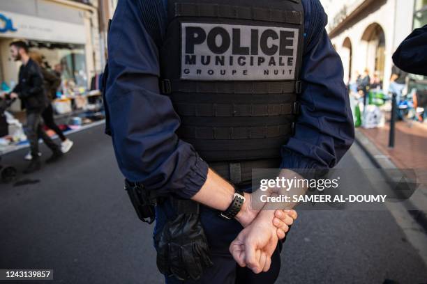 Member of the Municipal Police patrols during the visit of French far-right Rassemblement National leader and President of the party's parliamentary...