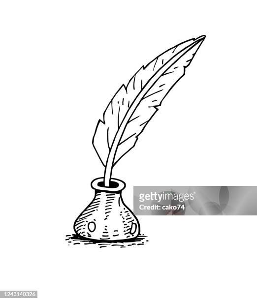 feather pen and ink bottle - poet stock illustrations