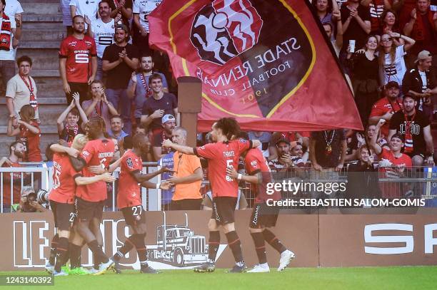 Rennes' players celebrate their team's fifth goal during the French L1 football match between Stade Rennais FC and AJ Auxerre at The Roazhon Park...