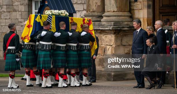 Vice Admiral Timothy Laurence, Britain's Sophie, Countess of Wessex and Britain's Prince Andrew, Duke of York look on as Britain's Princess Anne,...