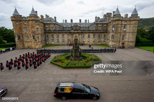 The hearse carrying the coffin of Queen Elizabeth II arrives at Palace of Holyroodhouse, Edinburgh, where she will lie overnight and then be moved to...