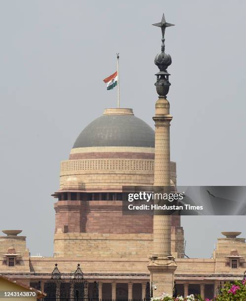 The Indian National flag at half-mast during the one-day state mourning, as a mark of respect to late Queen Elizabeth II, at Rashtrapati Bhawan, on...