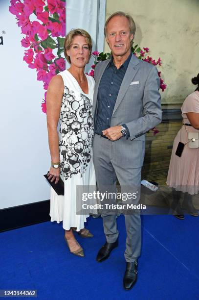 Gerhard Delling and his partner Christina Block attend the "Mamma Mia - Das Musical" premiere at Stage Theater Neue Flora on September 11, 2022 in...