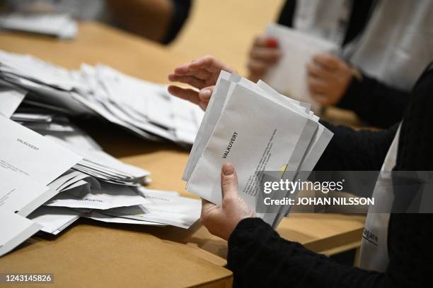 Vote counters count casted votes at a polling station in the Hasthagens Sport Center in Malmo, on September 11 during the general elections in...