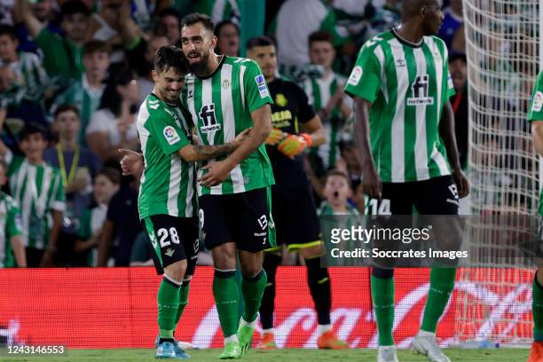 Rodrigo Sanchez of Real Betis celebrates 1-0 with Borja Iglesias of Real Betis during the La Liga Santander match between Real Betis Sevilla v...