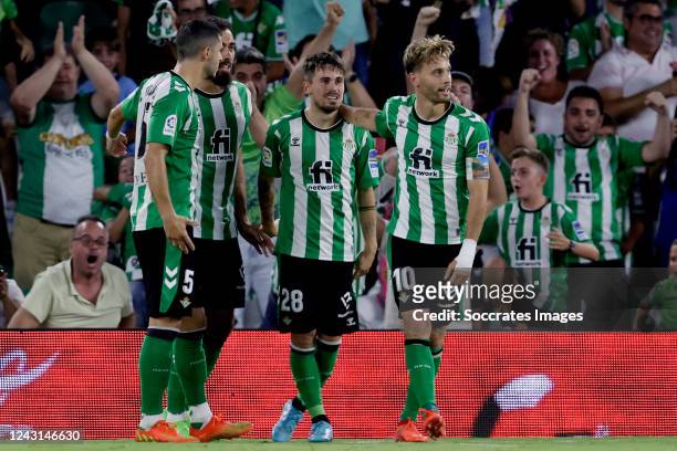 Rodrigo Sanchez of Real Betis celebrates 1-0 with Borja Iglesias of Real Betis, Sergio Canales of Real Betis, Guido Rodriguez of Real Betis during...