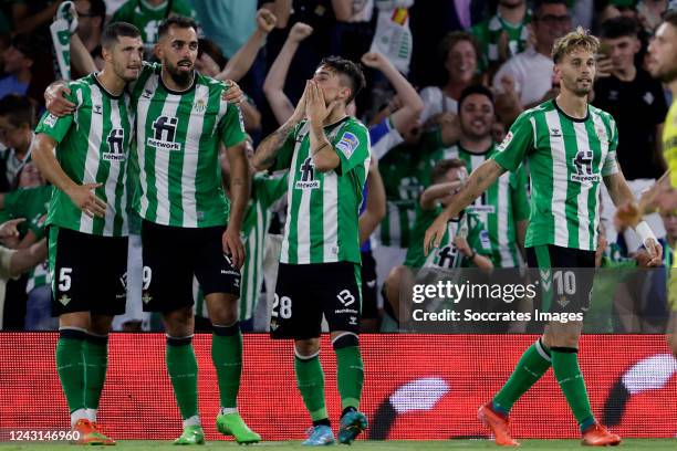 Rodrigo Sanchez of Real Betis celebrates 1-0 with Borja Iglesias of Real Betis, Sergio Canales of Real Betis, Guido Rodriguez of Real Betis during...