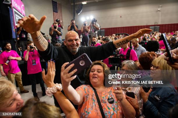 Pennsylvania Lt. Governor and US senatorial candidate John Fetterman greets supporters following a "Women For Fetterman" rally at Montgomery County...