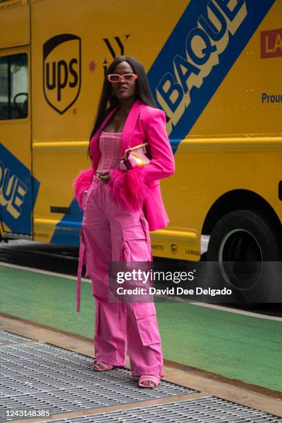 Jenn Ibe is seen wearing a Zara blazer, Meski top, ASOS pants and a handbag by Fendi during New York Fashion Week at Spring Studios on September 11,...