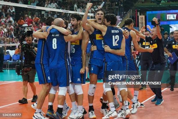 Italy's players celebrate winning the Men's Volleyball World Championship final match between Poland and Italy in Katowice, Poland on September 11,...