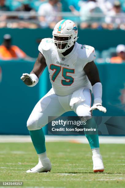 September 11: Miami Dolphins offensive tackle Greg Little blocks during the game between the New England Patriots and the Miami Dolphins, on Sunday,...