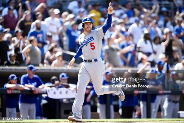 Freddie Freeman of the Los Angeles Dodgers celebrates as he scores during the sixth inning of a baseball game against the San Diego Padres September...