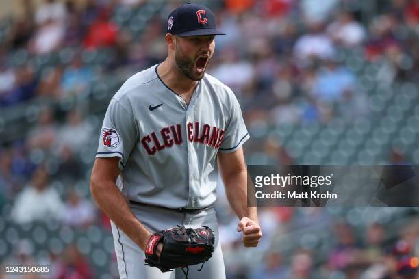 Sam Hentges of the Cleveland Guardians reacts after a strikeout against the Minnesota Twins during the seventh inning of the game at Target Field on...