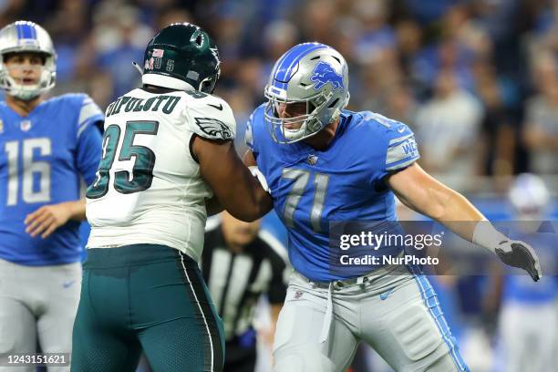 Detroit Lions guard Logan Stenberg defends against Philadelphia Eagles defensive tackle Marlon Tuipulotu during the first half of an NFL football...