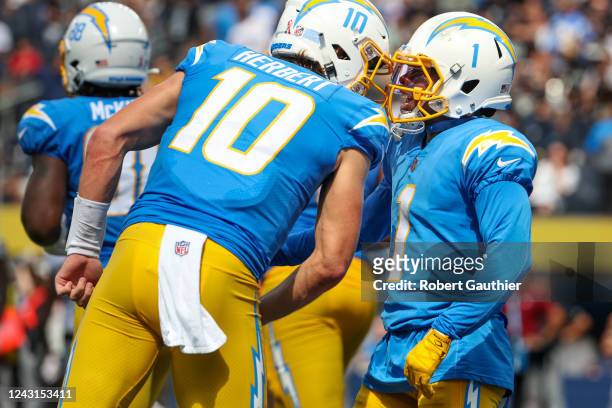 Inglewood, CA, Sunday, September 11, 2022 - Chargers receiver DeAndre Carter celebrates with quarterback Justin Herbert after they connect for a...