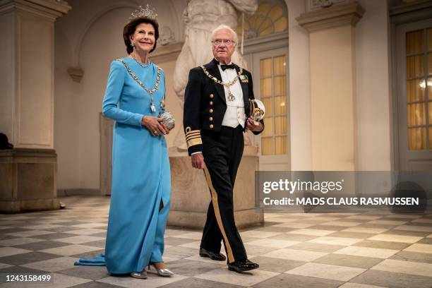 King Carl Gustav XVI and Queen Silvia of Sweden arrive at the gala banquet at Christiansborg Palace on September 11 during celebrations to mark the...