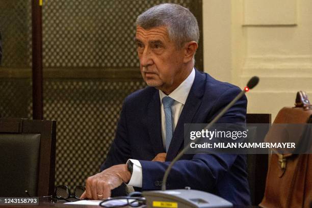 Former Czech Prime Minister Andrej Babis waits for the start of his trial over his involvement in an EU subsidy fraud case at court in Prague, Czech...