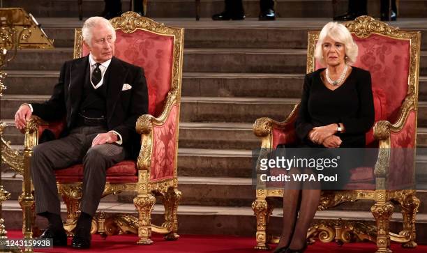 King Charles III and Camilla, Queen Consort, take part in an address in Westminster Hall at Houses of Parliament on September 12, 2022 in London,...