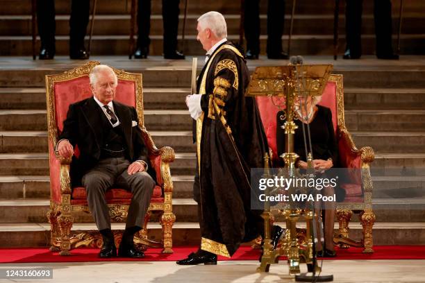 Speaker of the House of Commons Lindsay Hoyle interacts with King Charles III and Camilla, Queen Consort, in Westminster Hall at Houses of Parliament...