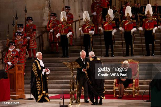 Lord Speaker John McFall and speaker of the House of Commons Lindsay Hoyle and Britain's King Charles III take part in the presentation of Addresses...