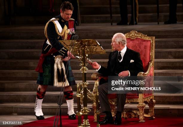 Britain's King Charles III attends the presentation of Addresses by both Houses of Parliament in Westminster Hall, inside the Palace of Westminster,...