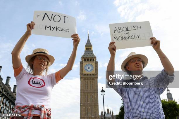 Anti-monarch protesters hold placards reading "Not My King" and "Abolish The Monarchy", on day four of public mourning following the death of Queen...